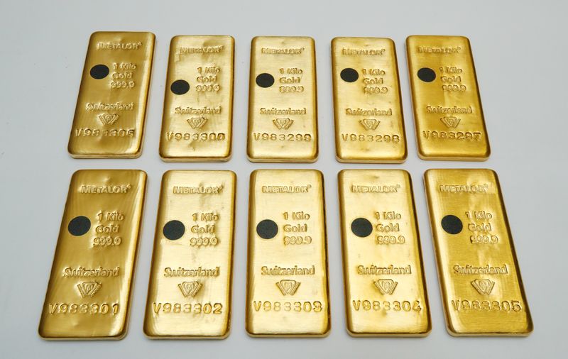 &copy; Reuters. The Sicpa Oasis validator system (bullion protect) is pictured on one kilogram bar of gold at Swiss refiner Metalor in Marin near Neuchatel, Switzerland July 5, 2019. Picture taken July 5, 2019.      To match Special Report GOLD-SWISS/FAKES     REUTERS/De