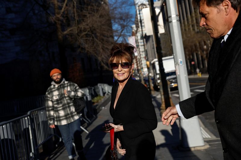 &copy; Reuters. Sarah Palin, 2008 Republican vice presidential candidate and former Alaska governor, arrives with former NHL hockey player Ron Duguay during her defamation lawsuit against the New York Times, at the United States Courthouse in the Manhattan borough of New