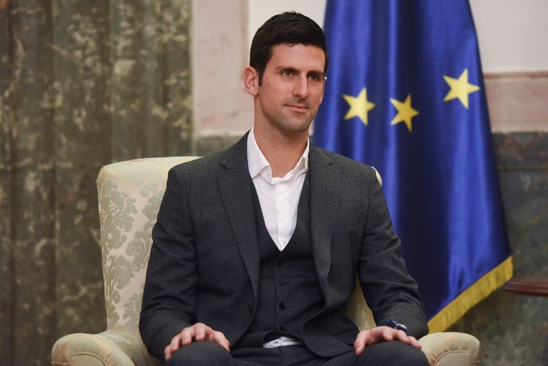 &copy; Reuters. FILE PHOTO: Serbian tennis player Novak Djokovic speaks with Serbia's President in Belgrade, Serbia, February 3, 2022. REUTERS/Zorana Jevtic