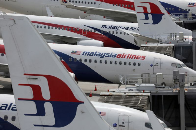 © Reuters. FILE PHOTO: Malaysia Airlines planes parked at Kuala Lumpur International Airport during the coronavirus disease (COVID-19) outbreak in Sepang, Malaysia, October 6, 2020. REUTERS/Lim Huey Teng/File Photo