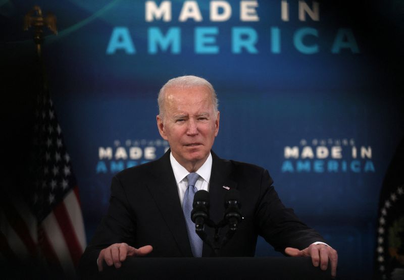 © Reuters. FILE PHOTO: U.S. President Joe Biden is framed by TV equipment as he speaks about his economic plan and his administration’s efforts to rebuild manufacturing, in the Eisenhower Executive Office Building's South Court Auditorium at the White House in Washington, U.S., February 8, 2022. REUTERS/Leah Millis/File Photo