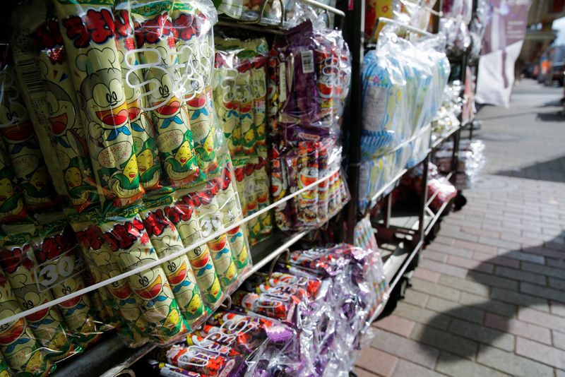 &copy; Reuters. FILE PHOTO: Several flavours of 'Umaibo', a popular Japanese corn snack, are displayed at a confectionery wholesaler's in Tokyo, Japan January 25, 2022. REUTERS/Akira Tomoshige