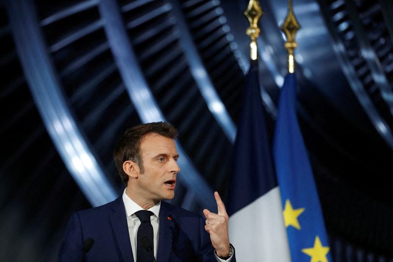 &copy; Reuters. FILE PHOTO: French President Emmanuel Macron delivers a speech at the main production site of GE Steam Power System, in Belfort, France, February 10, 2022. Jean-Francois Badias/Pool via REUTERS