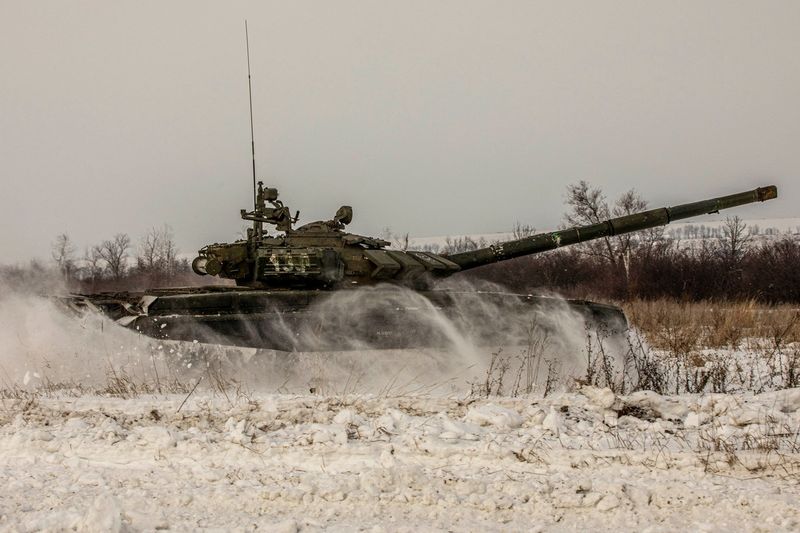 &copy; Reuters. A tank of Russian armed forces drives during military exercises in the Leningrad Region, Russia, in this handout picture released February 14, 2022. Russian Defence Ministry/Handout via REUTERS 