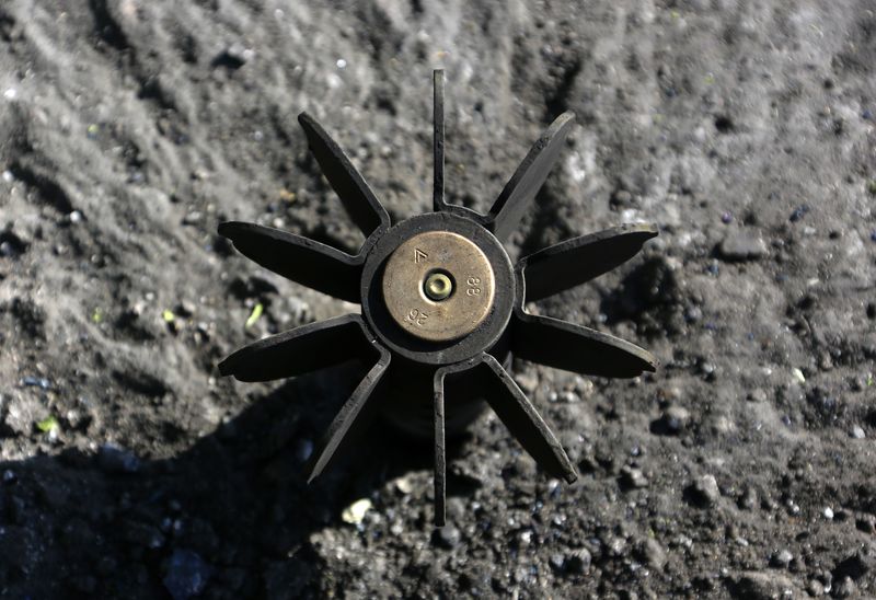&copy; Reuters. The remains of a Ukrainian army 120mm mortar shell is seen at a front line of the pro-Russian position on the outskirts of the eastern Ukrainian town of Slaviansk May 17, 2014. REUTERS/Yannis Behrakis
