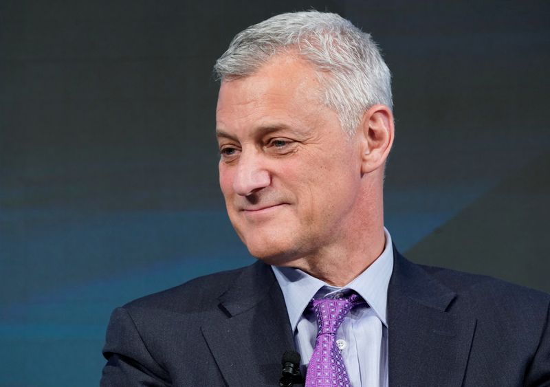 &copy; Reuters. FILE PHOTO: Bill Winters, Group Chief Executive Officer of Standard Chartered Bank, smiles during the World Economic Forum (WEF) annual meeting in Davos, Switzerland January 24, 2018.  REUTERS/Denis Balibouse