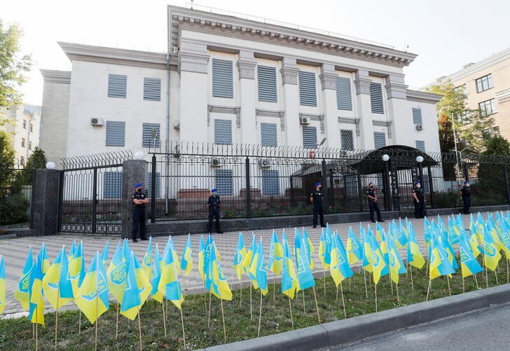 &copy; Reuters. Around 150 Ukrainian flags symbolizing  14,000 people killed in a conflict between Ukrainian troops and Russian-backed separatist forces in the eastern Donbas region since 2014 are seen in front of the Russian embassy during a rally in Kyiv, Ukraine, Augu