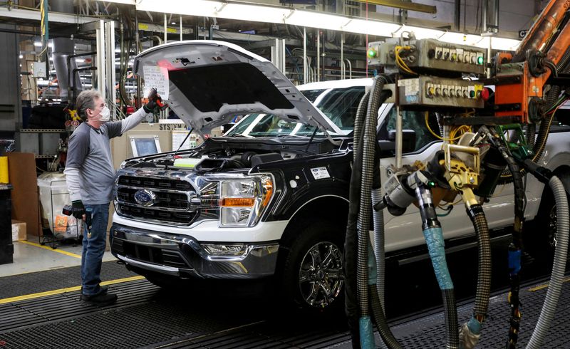 &copy; Reuters. FILE PHOTO: An assembly worker of Ford Motor works on an F-series pickup truck at the Dearborn Truck Plant in Dearborn, Michigan, U.S., January 26, 2022.  REUTERS/Rebecca Cook/File Photo