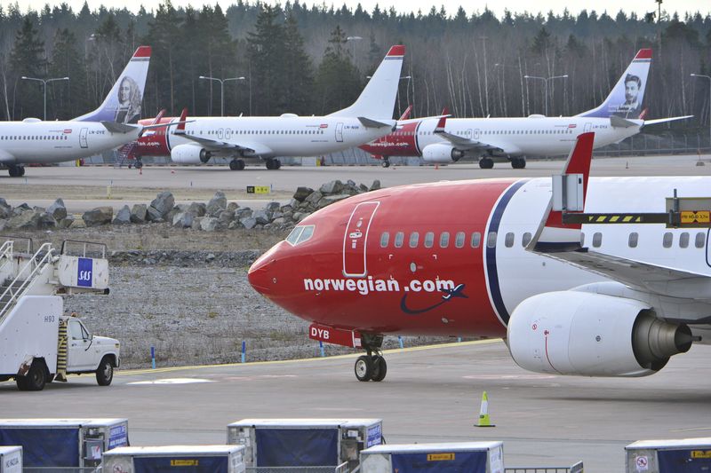 &copy; Reuters. FILE PHOTO: A view of parked aircraft belonging to budget carrier Norwegian at Stockholm Arlanda Airport in this March 5, 2015 file photo. REUTERS/Johan Nilsson/TT News Agency/Files