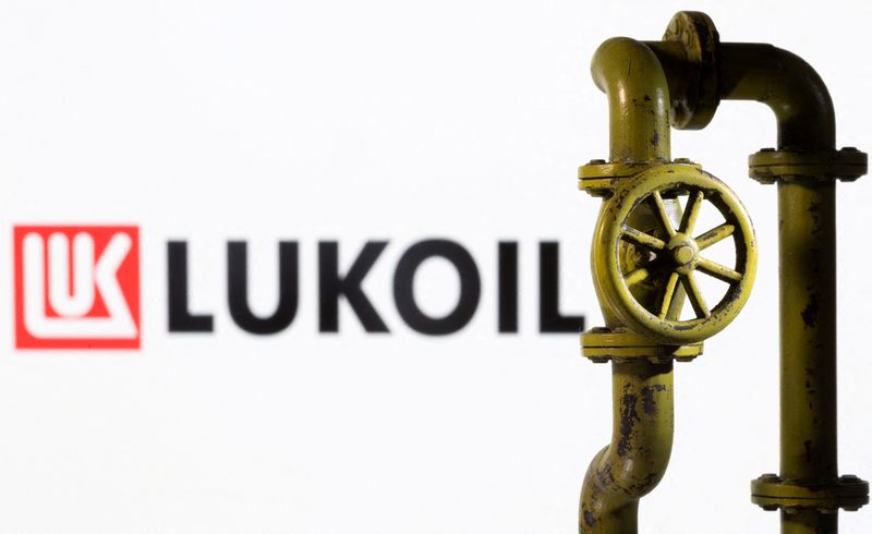 &copy; Reuters. A 3D printed natural gas pipeline is placed in front of displayed Lukoil logo in this illustration taken, February 8, 2022. REUTERS/Dado Ruvic/Illustration