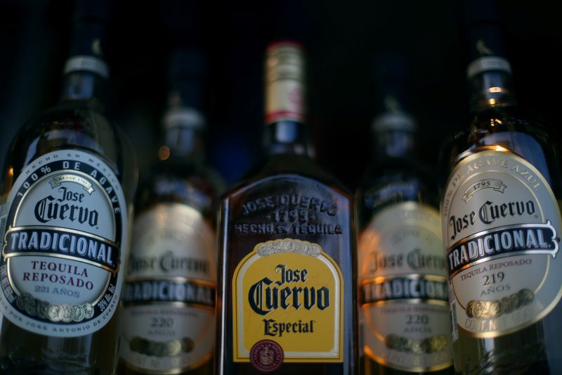&copy; Reuters. FILE PHOTO - Bottles of Jose Cuervo Tequila rest on a shelf in Mexico City, Mexico, February 8, 2017. REUTERS/Edgard Garrido