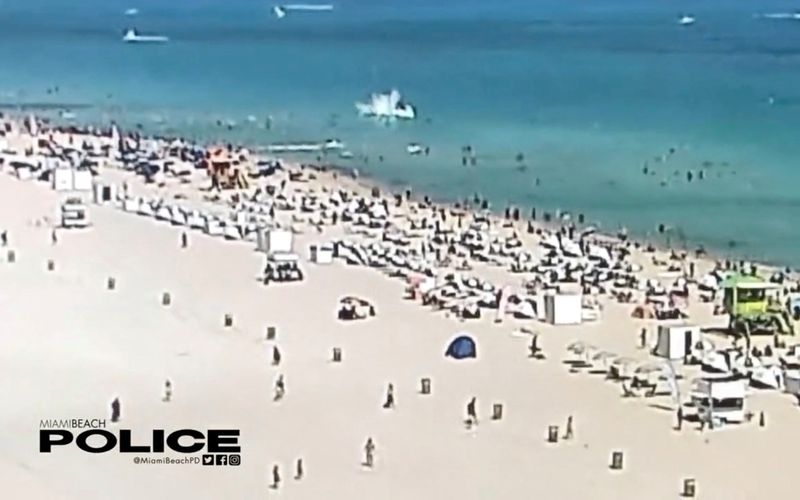 Helicopter crashes into waves off crowded Miami beach