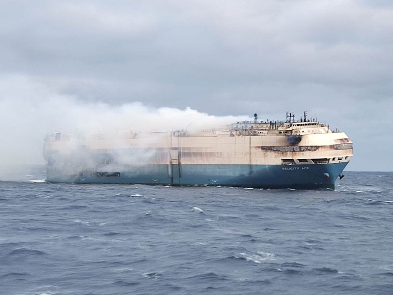 Firefighters struggle to douse fire on luxury cars vessel off Azores islands