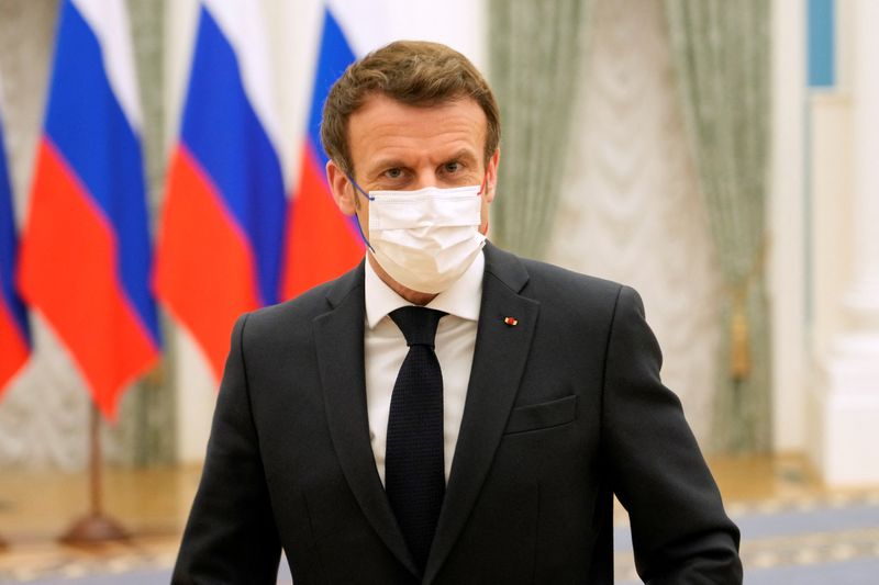 &copy; Reuters. French President Emmanuel Macron leaves after attending a joint press conference with Russian President Vladimir Putin (not pictured), in Moscow, Russia, February 7, 2022. Thibault Camus/Pool via REUTERS