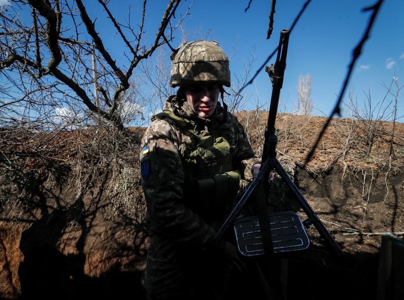 Ukrainian soldiers report increased shelling on the front lines, fearing 'provocations'