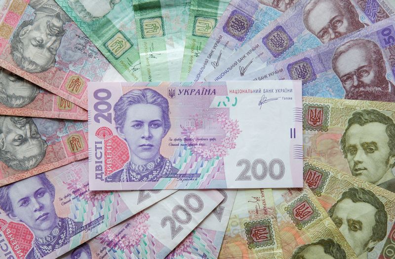 &copy; Reuters. FILE PHOTO: Ukrainian hryvnia banknotes are seen in a photo illustration shot in Kiev, Ukraine, August 6, 2014. REUTERS/Konstantin Chernichkin/Ullustration