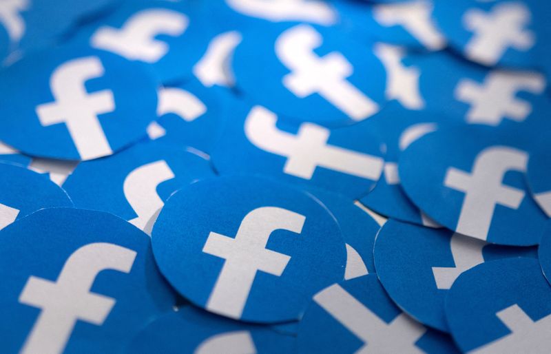 &copy; Reuters. FILE PHOTO: Printed Facebook logos are seen in this illustration taken February 15, 2022. REUTERS/Dado Ruvic/Illustration/File Photo