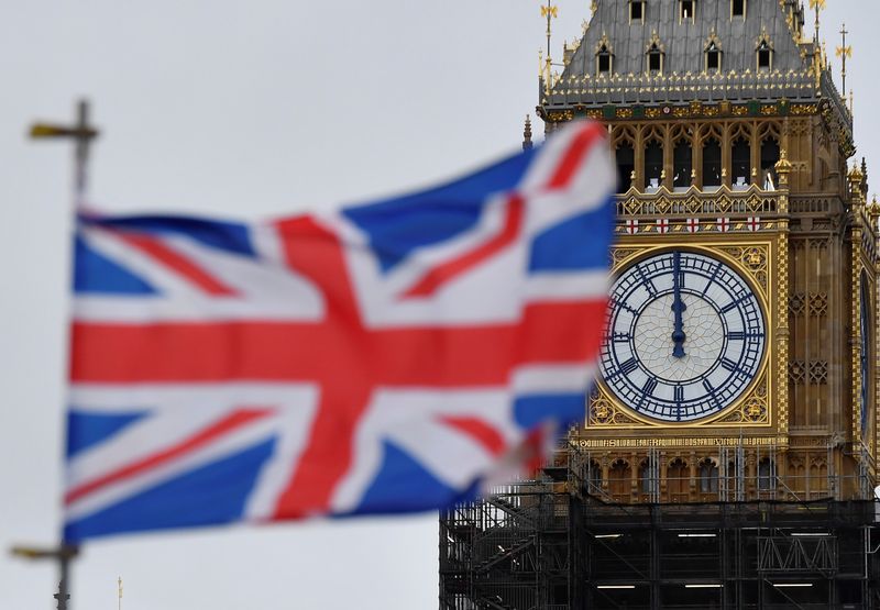 &copy; Reuters. FILE PHOTO: A clock face is seen at midday on Elizabeth Tower, more commonly known as the Big Ben, ahead of New Year's Eve events when all four faces will be visible for first time to ring in the new year since restoration works commenced in 2017 at the H