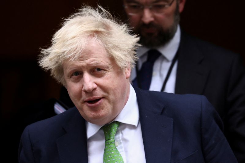 © Reuters. British Prime Minister Boris Johnson walks outside Downing Street, in London, Britain February 22, 2022. REUTERS/Henry Nicholls