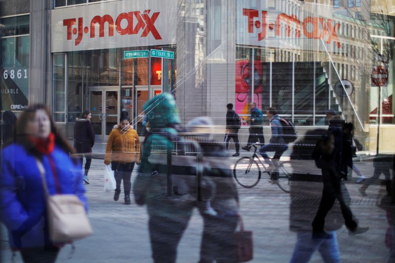 &copy; Reuters. FILE PHOTO - Pedestrians are reflected in and seen through a shop window as they pass a T.J. Maxx store in Boston, Massachusetts, U.S., February 21, 2017.   REUTERS/Brian Snyder
