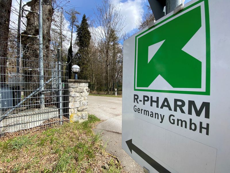 &copy; Reuters. FILE PHOTO: The logo of R-Pharm is pictured at the site where the German pharmaceutical firm is believed to produce the Russian Sputnik V COVID-19 vaccine, near the Bavarian town of Illertissen, Germany, April 8, 2021. REUTERS/Ayhan Uyanik