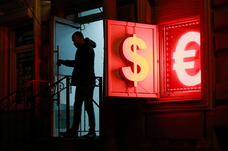 &copy; Reuters. A man walks out of a currency exchange office in Saint Petersburg, Russia January 26, 2022. REUTERS/Anton Vaganov