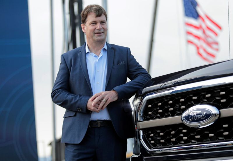 &copy; Reuters. FILE PHOTO: Ford Motor Co. CEO Jim Farley poses next to a new 2021 Ford F-150 pickup truck at the Rouge Complex in Dearborn, Michigan, U.S. September 17, 2020. REUTERS/Rebecca Cook