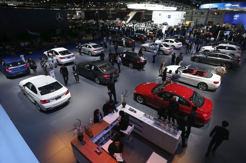 &copy; Reuters. FILE PHOTO: Visitors gather around displays during a media presentation at the 37th Bangkok International Motor Show in Bangkok, Thailand in this March 22, 2016 file photo.  REUTERS/Chaiwat Subprasom/Files