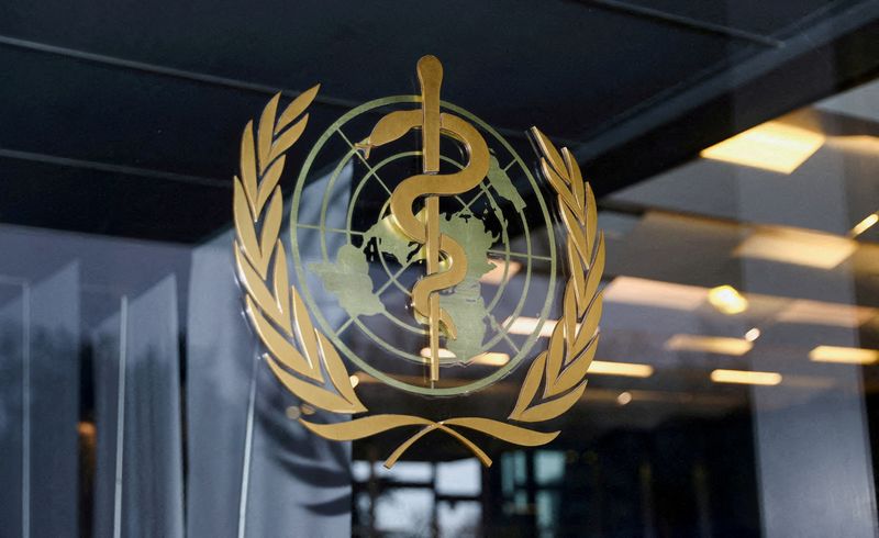 &copy; Reuters. FILE PHOTO: The World Health Organization logo is pictured at the entrance of the WHO building, in Geneva, Switzerland, December 20, 2021. REUTERS/Denis Balibouse