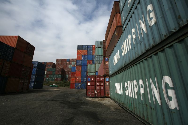 &copy; Reuters. FILE PHOTO: Unused shipping containers are piled up at a storage depot in north-west Hong Kong February 18, 2009. REUTERS/Bobby Yip 