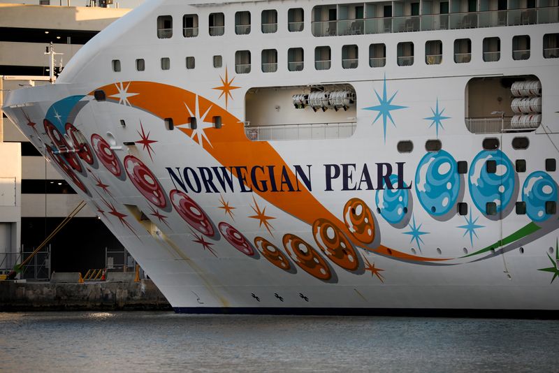 &copy; Reuters. FILE PHOTO: The Norwegian Pearl cruise ship is seen docked at Miami port, after Norwegian Cruise Line Holdings Ltd cancelled sailings amid rising fears of Omicron-related coronavirus infections, in Miami, Florida, U.S. January 5, 2022. REUTERS/Marco Bello
