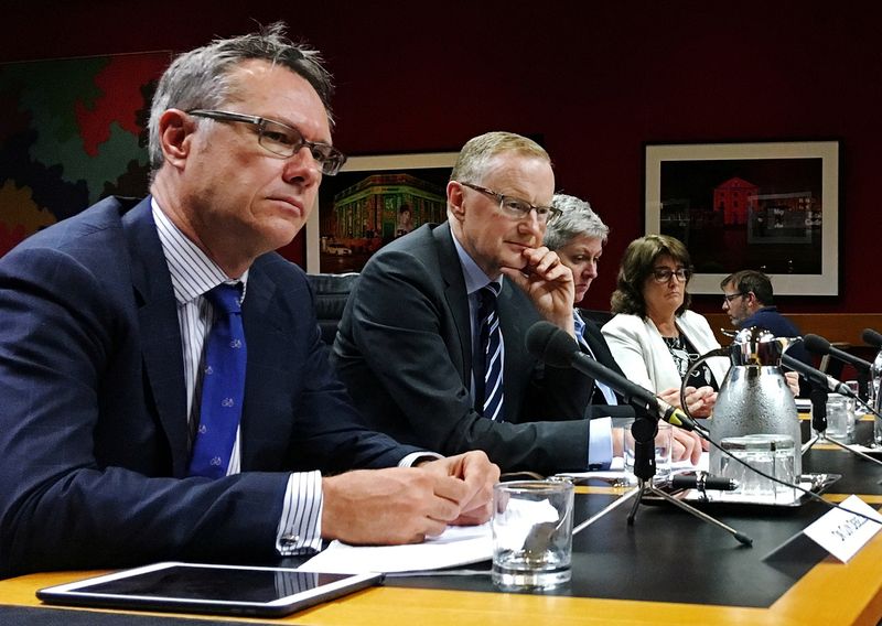 &copy; Reuters. FILE PHOTO: Reserve Bank of Australia Governor Philip Lowe (2nd L) speaks at a parliamentary committee hearing as he sits next to Deputy Governor Guy Debelle (L) in Sydney, Australia February 22, 2019. REUTERS/Tom Westbrook