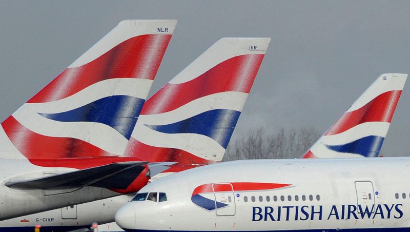 &copy; Reuters. FILE PHOTO: British Airways aircraft are parked at Heathrow Airport in west London February 5, 2010.  REUTERS/Toby Melville
