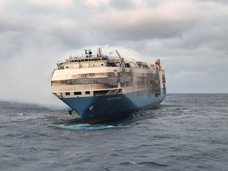 &copy; Reuters. FILE PHOTO: The ship, Felicity Ace, which was traveling from Emden, Germany, where Volkswagen has a factory, to Davisville, in the U.S. state of Rhode Island, burns more than 100 km from the Azores islands, Portugal, February 18, 2022. Portuguese Navy (Ma