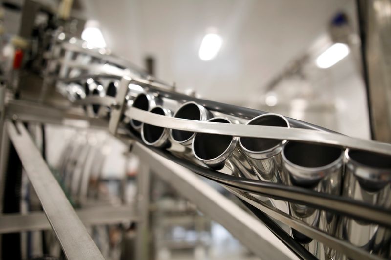 &copy; Reuters. FILE PHOTO - Beverage cans are run through machinery during a tour at a Canopy Growth facility that produces cannabis derivatives in Smiths Falls, Ontario, Canada October 29, 2019.  REUTERS/Blair Gable