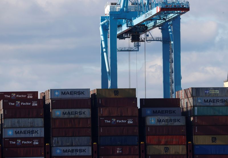 &copy; Reuters. FILE PHOTO - Shipping containers are seen on a ship at a pier at Port Newark, New Jersey, U.S., November 19, 2021. REUTERS/Mike Segar