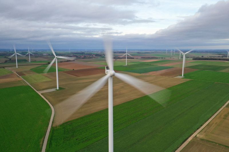 &copy; Reuters. FILE PHOTO: An aerial view shows power-generating windmill turbines in a wind farm in Morchies, France, November 8, 2020. Picture taken with a drone REUTERS/Pascal Rossignol/File Photo
