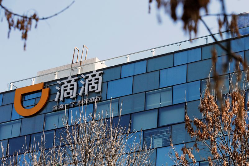 &copy; Reuters. FILE PHOTO: A Didi logo is seen at the headquarters of Didi Chuxing in Beijing, China November 20, 2020. REUTERS/Florence Lo/File Photo