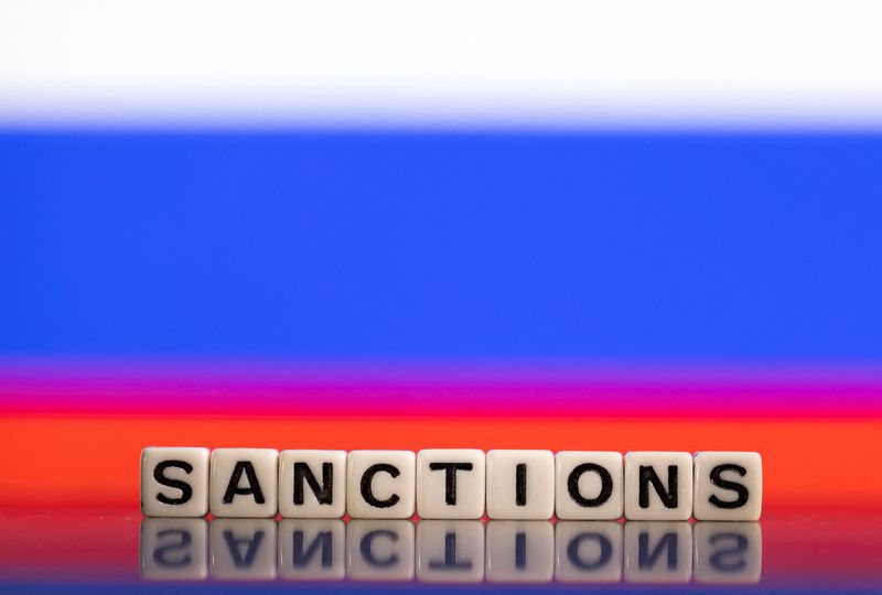 &copy; Reuters. FILE PHOTO: Plastic letters arranged to read "Sanctions" are placed in front of Russian flag colors in this illustration taken February 25, 2022. REUTERS/Dado Ruvic/Illustration