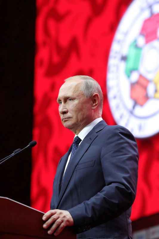 &copy; Reuters. الرئيس الروسي فلاديمير بوتين الرئيس الشرفي للاتحاد الدولي للجودو. صورة من سبوتنيك.