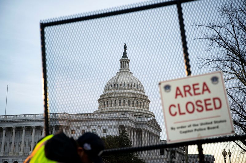 &copy; Reuters. The U.S. Capitol, seen behind newly installed security fencing ahead of the upcoming State of the Union with U.S. President Joe Biden, in Washington, U.S., February 27, 2022. REUTERS/Al Drago