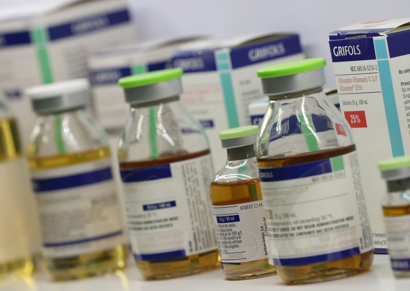 &copy; Reuters. FILE PHOTO: Grifols's medicines are displayed at their headquarters in Sant Cugat del Valles, near Barcelona, Spain May 25, 2018. REUTERS/Albert Gea/File Photo