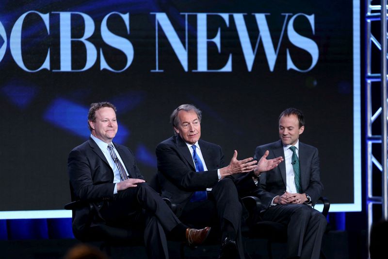 &copy; Reuters. FILE PHOTO: Chris Licht (L), Vice President of Programming for CBS News and Executive Producer of "CBS This Morning", Charlie Rose, co-host of "CBS This Morning" and David Rhodes (R), President of CBS News, speak during the CBS News panel at the Televisio