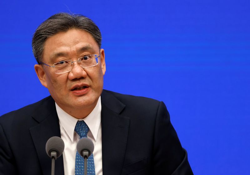 &copy; Reuters. FILE PHOTO: Chinese Commerce Minister Wang Wentao attends a State Council Information Office news conference in Beijing, China February 24, 2021. REUTERS/Carlos Garcia Rawlins