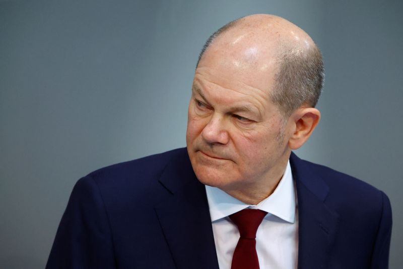 &copy; Reuters. FILE PHOTO - German Chancellor Olaf Scholz addresses an extraordinary session, after Russia launched a massive military operation against Ukraine, at the lower house of parliament Bundestag in Berlin, Germany, February 27, 2022. REUTERS/Fabrizio Bensch