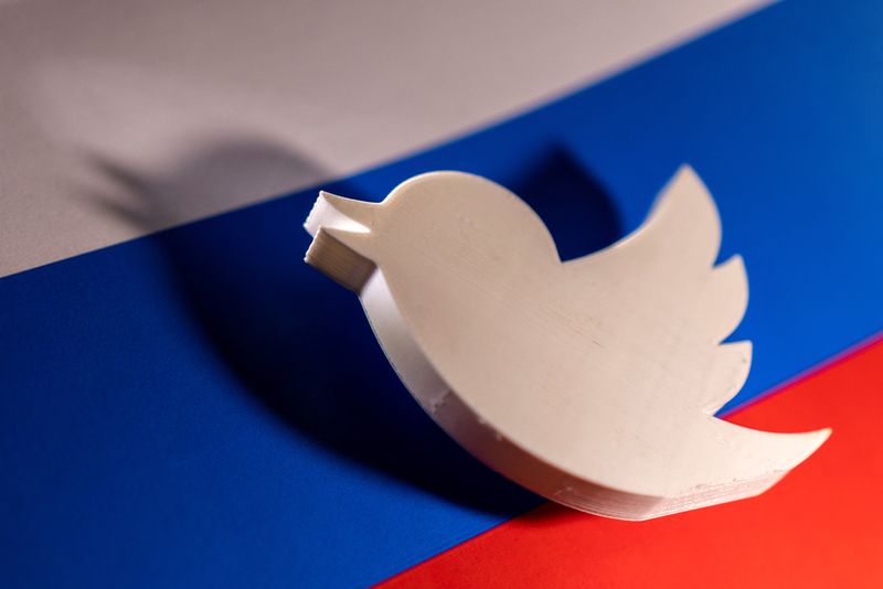 &copy; Reuters. FILE PHOTO: Twitter logo is placed on a Russian flag in this illustration picture taken February 26, 2022. REUTERS/Dado Ruvic/Illustration