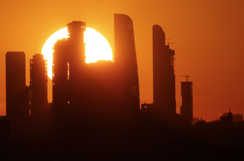 &copy; Reuters. FILE PHOTO: The sun sets behind the skyscrapers of the Moscow International Business Centre, also known as "Moskva-City", in Moscow, Russia April 23, 2018. REUTERS/Anton Vaganov