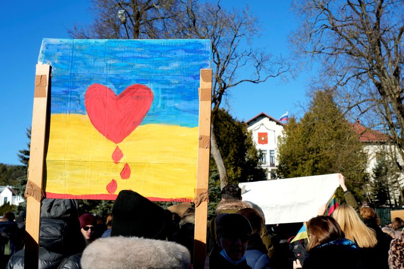 &copy; Reuters. People attend women's protest march in front of the Russian embassy in Vilnius, Lithuania February 27, 2022. REUTERS/Ints Kalnins