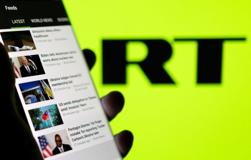 &copy; Reuters. FILE PHOTO: RT app is seen on a smartphone in front of their logo in this illustration taken February 28, 2022. REUTERS/Dado Ruvic/Illustration