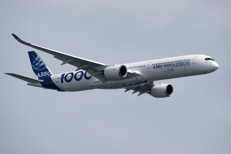 &copy; Reuters. FILE PHOTO: The Airbus A350-1000 seen in the aerial display during the media preview of the Singapore Airshow in Singapore,  February 13, 2022. REUTERS/Caroline Chia